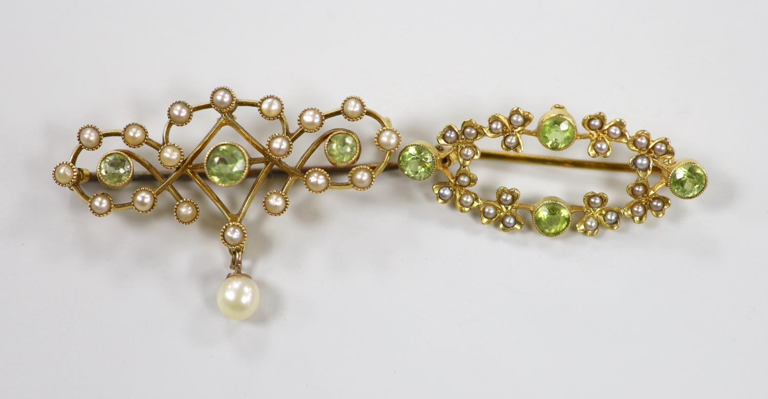 Two late Victorian 15ct, peridot and seed pearl set brooches, one with drop pearl, 41mm, gross