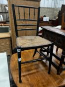 A 19th century ebonised beech rush seat Sussex style chair, width 41cm, height 83cm