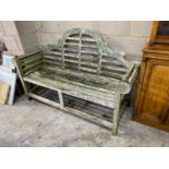 A Lutyens style weathered teak garden bench, length 165cm, depth 64cm, height 101cm