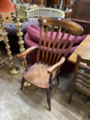 A Victorian elm and beech kitchen lathe back armchair, width 51cm, depth 44cm, height 112cm