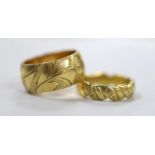 Two engraved 18ct gold wedding bands, sizes K and L/M, 15.7 grams.