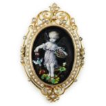 A Victorian oval gold and enamel pendant/brooch, painted with a cherub offering cherries to a