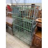 A vintage French painted wrought iron wine cage, width 103cm, depth 56cm, height 164cm