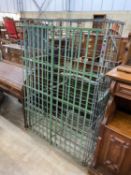 A vintage French painted wrought iron wine cage, width 103cm, depth 56cm, height 164cm