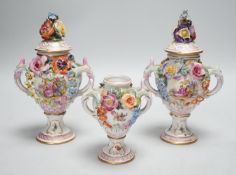 Three 19th century Dresden floral encrusted vases, two with covers, 16cm
