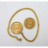 A Victorian 1893 gold sovereign and a 1913 god sovereign in a later 9ct gold pendant mount, on a 9ct