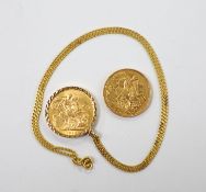 A Victorian 1893 gold sovereign and a 1913 god sovereign in a later 9ct gold pendant mount, on a 9ct