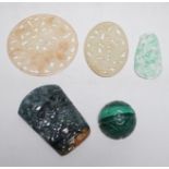 Two Chinese jadeite carvings, two pierce hardstone plaques and a malachite carving (5)