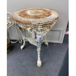 A Victorian painted cast iron circular Britannia table with pierced lattice work top, diameter 61cm,