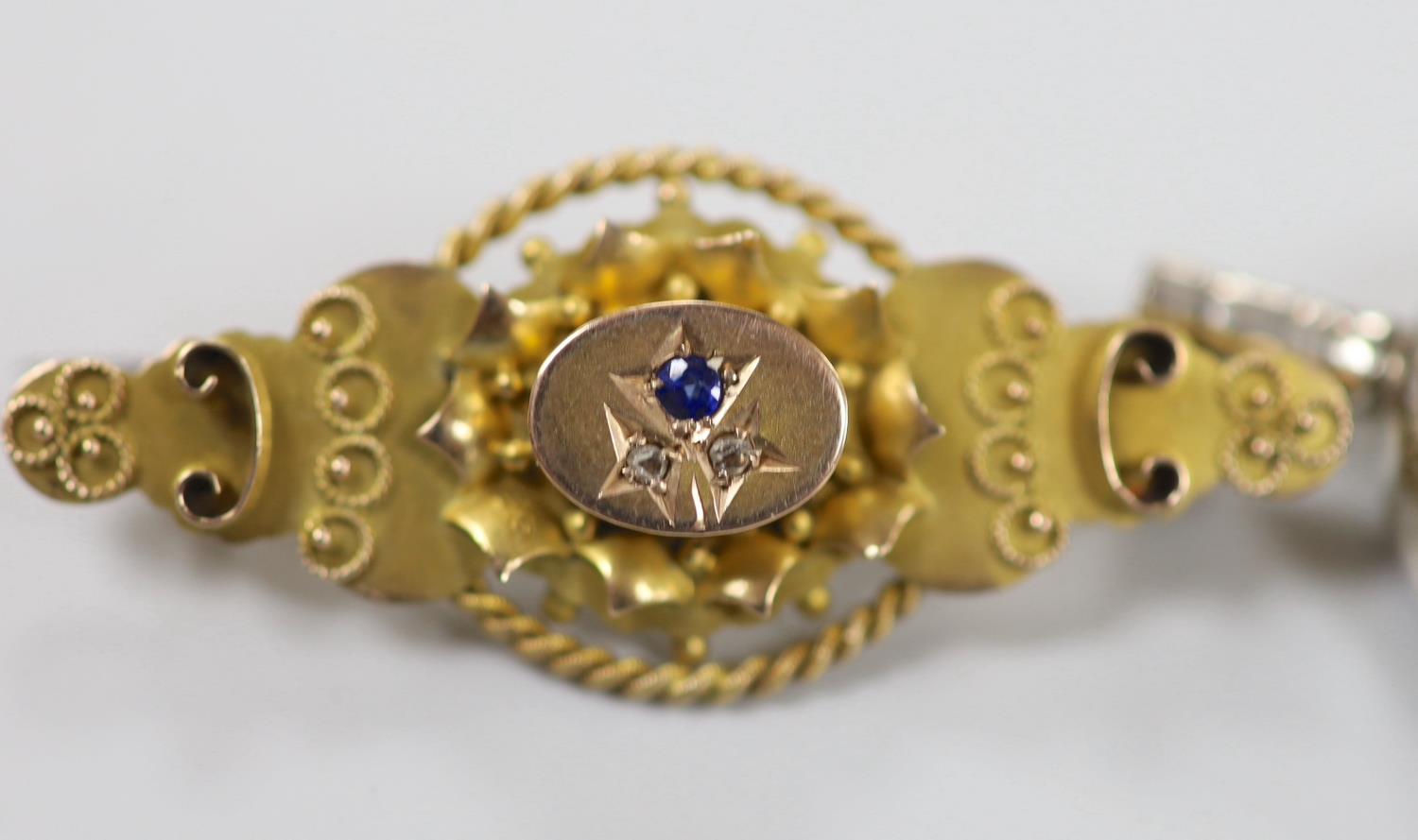 An Edwardian 9ct gold, sapphire and diamond chip set three stone brooch, 41mm, gross weight 33 grams - Image 2 of 3