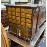 A Chinese elm medicine cabinet, width 65cm, depth 25cm, height 64cm