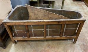 A 19th century French oak bath with zinc liner and cover, length 142cm, depth 65cm, height 64cm