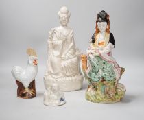A Chinese enamelled blanc de chine figure of Guanyin, together with three other figures. 28cm tall