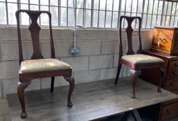 A pair of 18th century oak and walnut dining chairs