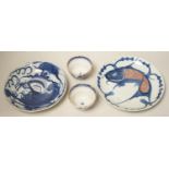 Two 19th century Chinese blue and white dishes and two 18th century tea bowls, largest 23cm