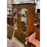 An Edwardian inlaid mahogany mirrored wardrobe, width 158cm, depth 52cm, height 208cm
