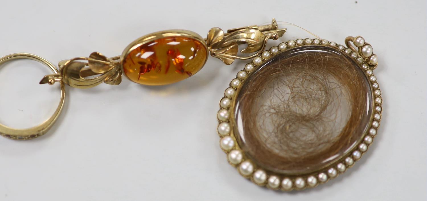 A 19th century yellow metal and split pearl mounted glazed mourning locket pendant containing a lock - Image 3 of 4