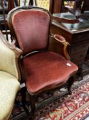 A late 19th century French upholstered oak fauteuil, width 68cm, depth 50cm, height 91cm