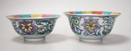 A near pair of Chinese doucai bowls. Tallest 7cm