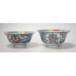 A near pair of Chinese doucai bowls. Tallest 7cm