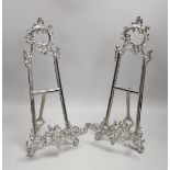 A pair of silver plated Rococo style easels, 41cm