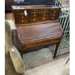 A George III mahogany cylinder bureau with fifteen drawer superstructure, width 92cm, depth 51cm,