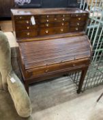 A George III mahogany cylinder bureau with fifteen drawer superstructure, width 92cm, depth 51cm,