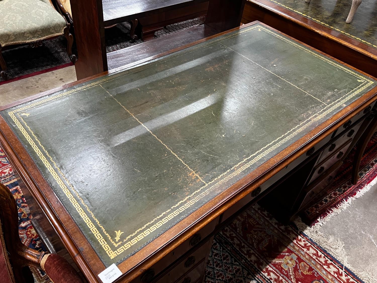 An early 20th century mahogany leather topped pedestal desk, width 137cm, depth 75cm, height 74cm - Image 2 of 4