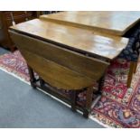 An 18th century oak bobbin turned gateleg table, width 102cm, depth 38cm, height 72cm