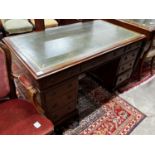 An early 20th century mahogany leather topped pedestal desk, width 137cm, depth 75cm, height 74cm