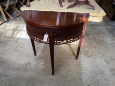 A reproduction George III style mahogany demi lune folding tea table, width 77cm, depth 38cm, height