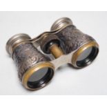 A pair of late Victorian repousse silver mounted brass opera glasses, Birmingham, 1900, (cased)