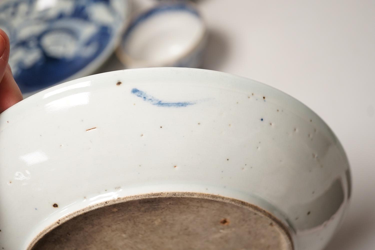 Two 19th century Chinese blue and white dishes and two 18th century tea bowls, largest 23cm - Image 5 of 18