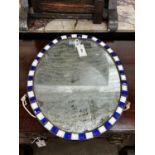 An oval Irish style wall mirror, width 41cm, height 51cm