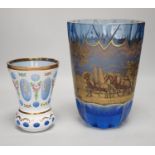 Two Bohemian glass vases, The largest blue glass vase in a mood with a horse and carriage scene,