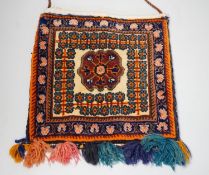 A Qashgai bag with tassel decoration, 31 x 29cm