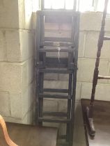 A painted vintage extending ladder.