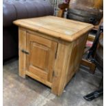 A Victorian stripped pine bedside cupboard, width 60cm, depth 61cm, height 63cm