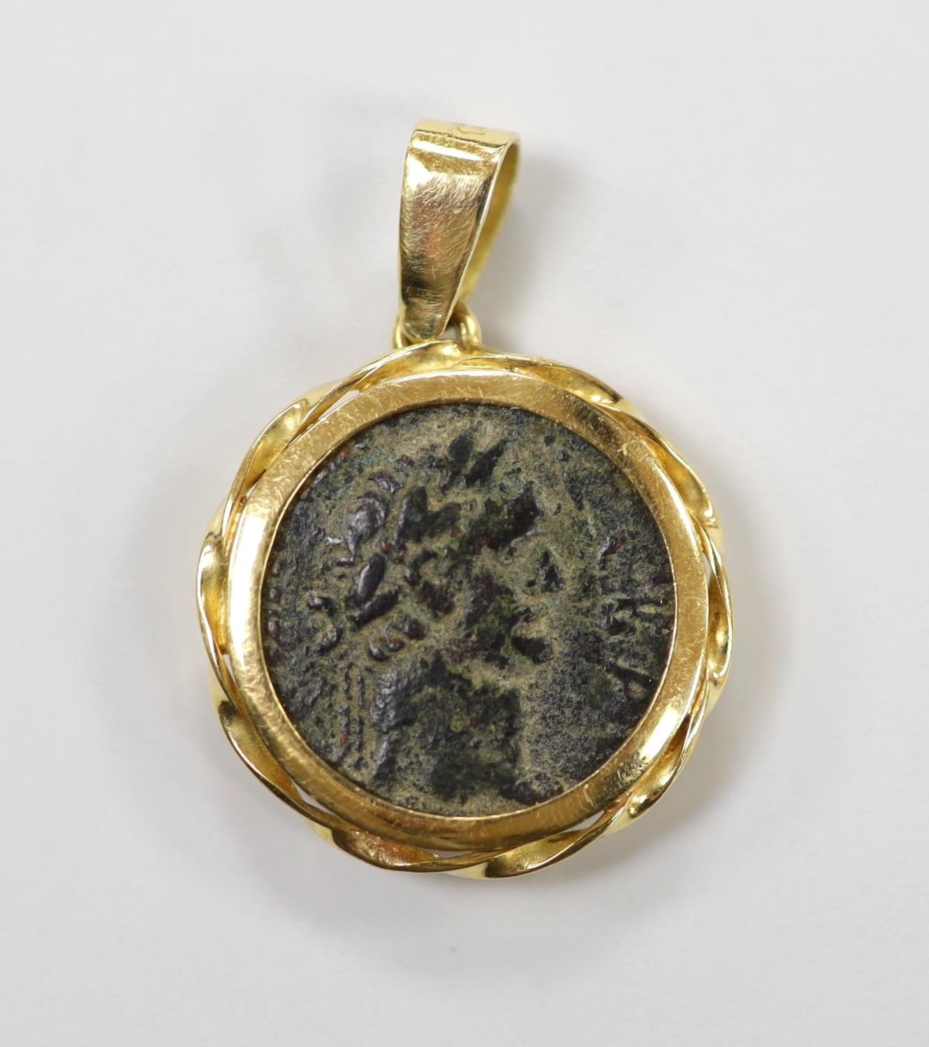 An ancient Roman bronze coin, now in an 18k pendant mount, diameter 21mm, gross weight 11 grams. - Image 2 of 3