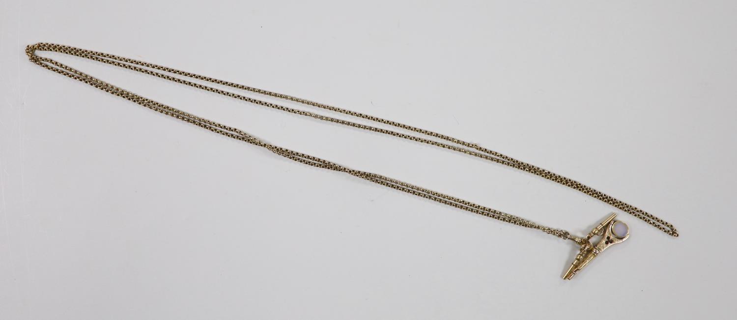An Edwardian yellow metal guard chain, 170cm, 21.6 grams, hung with three yellow metal overlaid - Image 3 of 3