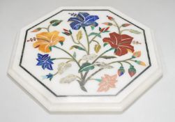 An Agra hardstone inlaid table top. 30cm wide