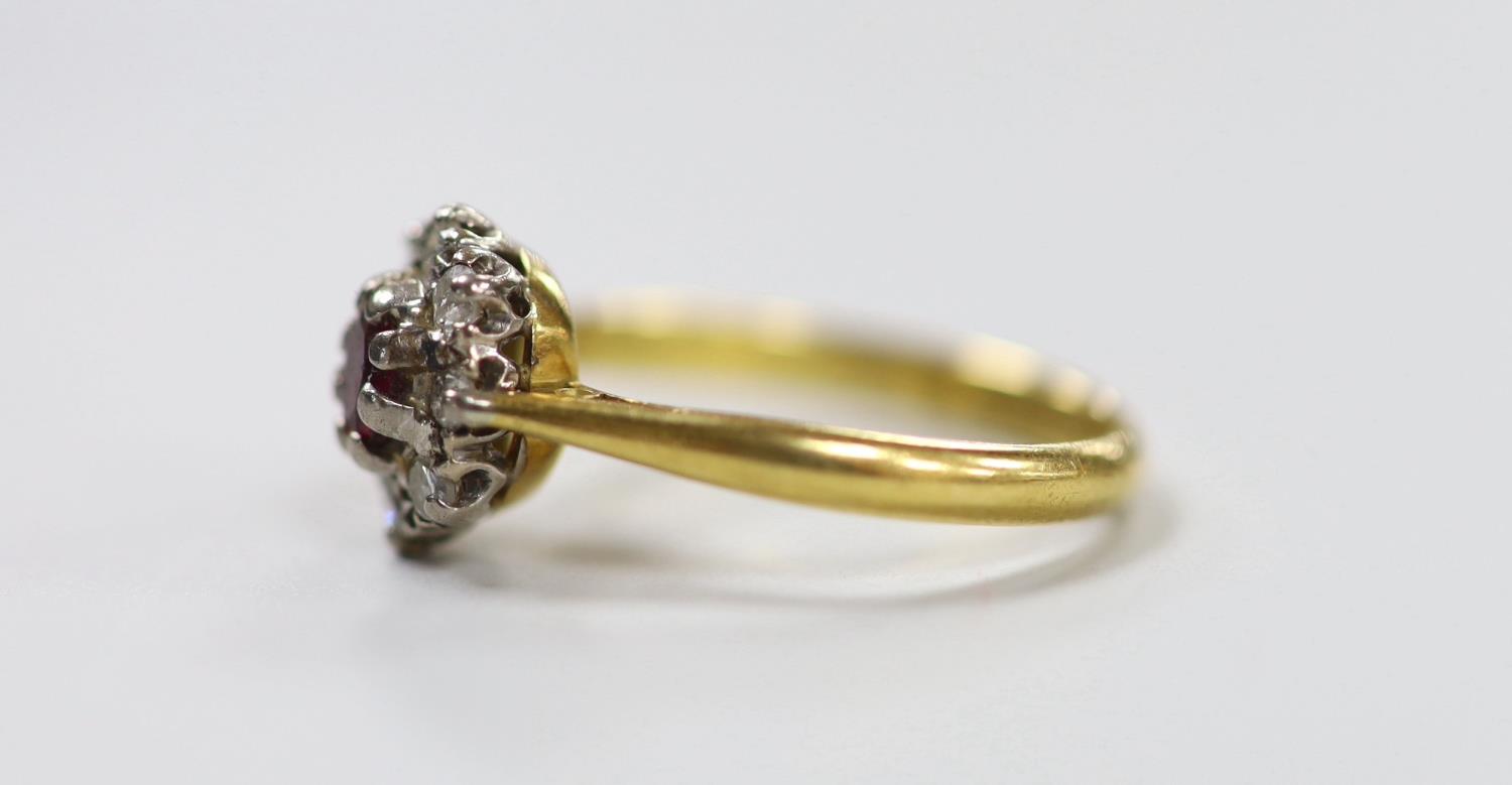 A modern 18ct gold, garnet? and diamond set oval cluster ring, size M, gross weight 3.2 grams. - Image 3 of 4