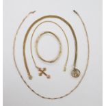 Two 9ct pendant necklaces, one with cross pendant, a 9ct gold hinged bangle and a 9ct chain, 23.4