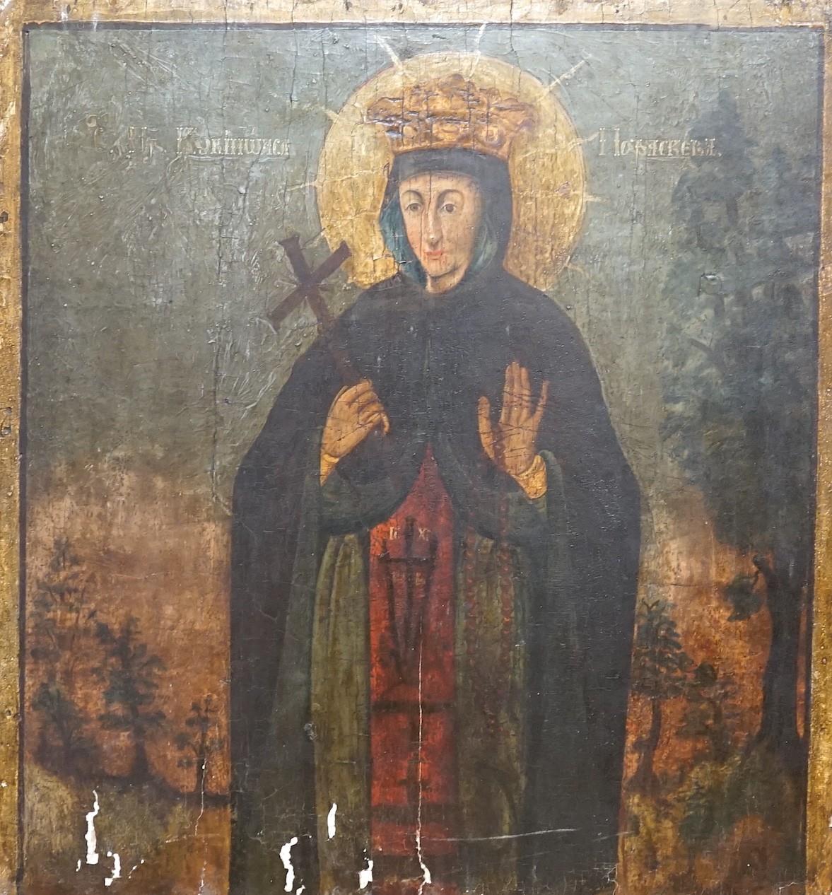 19th century Russian School, tempera on panel, Icon of a female saint, 62 x 58cm