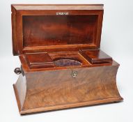 A 19th century mahogany sarcophagus shaped tea caddy, 34cm wide