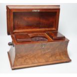 A 19th century mahogany sarcophagus shaped tea caddy, 34cm wide