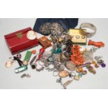 Assorted costume jewellery and other items including a silver belt buckle and enamelled egg