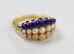 An early to mid 20th century yellow metal and graduated lapis lazuli, split pearl and coral set