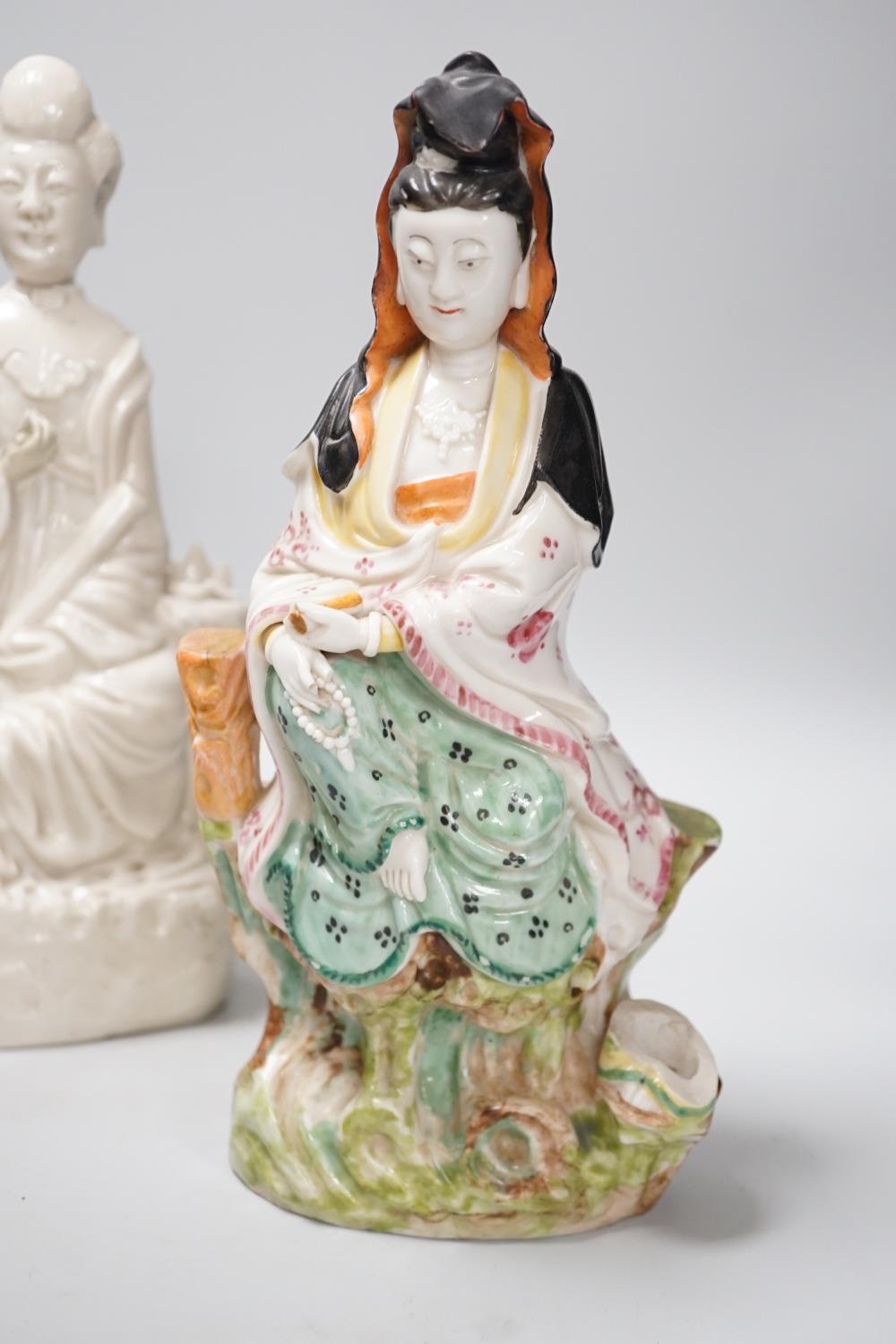 A Chinese enamelled blanc de chine figure of Guanyin, together with three other figures. 28cm tall - Image 5 of 11