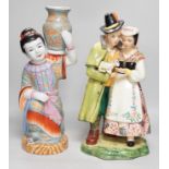 A Chinese porcelain figure of a lady together with a continental porcelain figure group, tallest